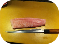 This beautiful piece of white tuna belly is ready to serve. It won't last long though.
